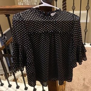 Black and white polkadot shirt